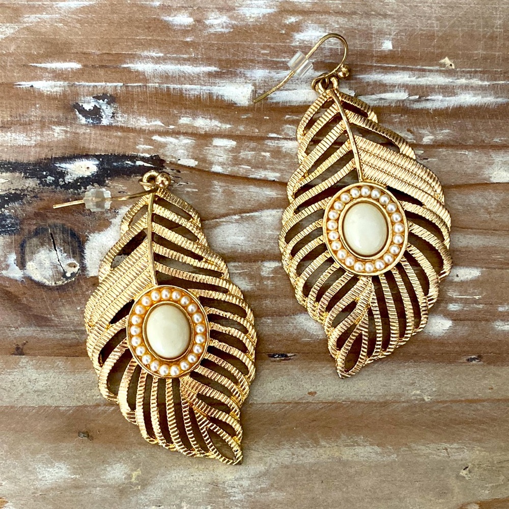 Gold and white feather earrings